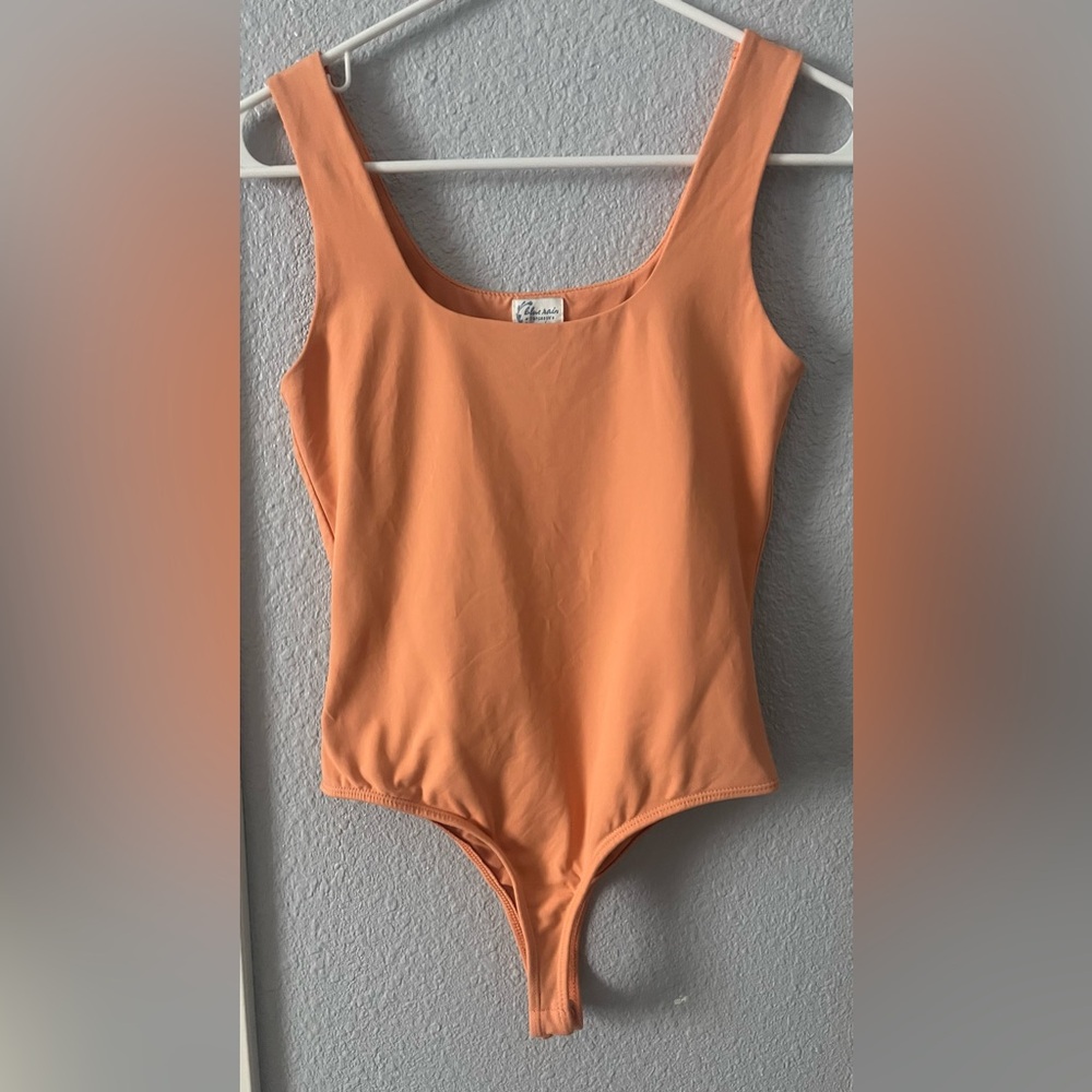 blue rain by Francesca’s women’s peach bodysuit